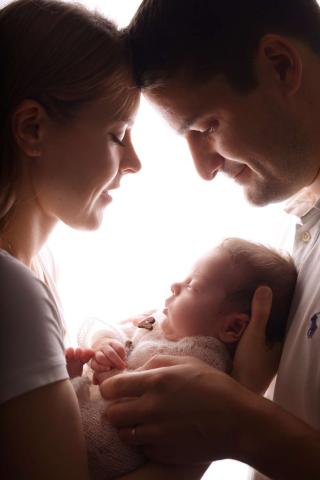 Newborn baby photo shoot with parents in London